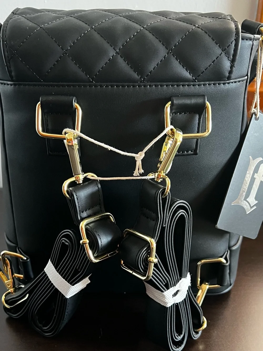 Loungefly Black Quilted Backpack with Gold Hardware Accents